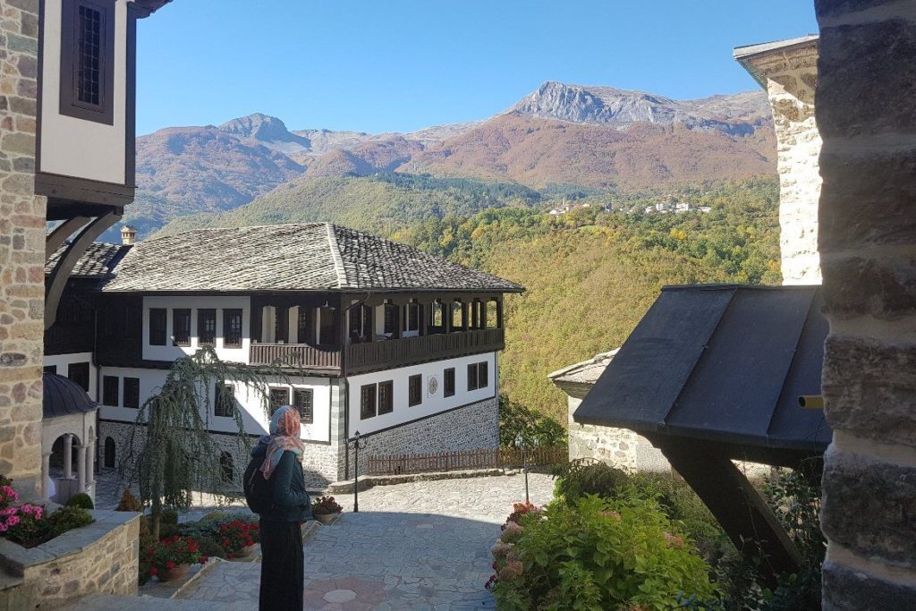 woman standing within the Sveti Jovan Bigorski Monastery